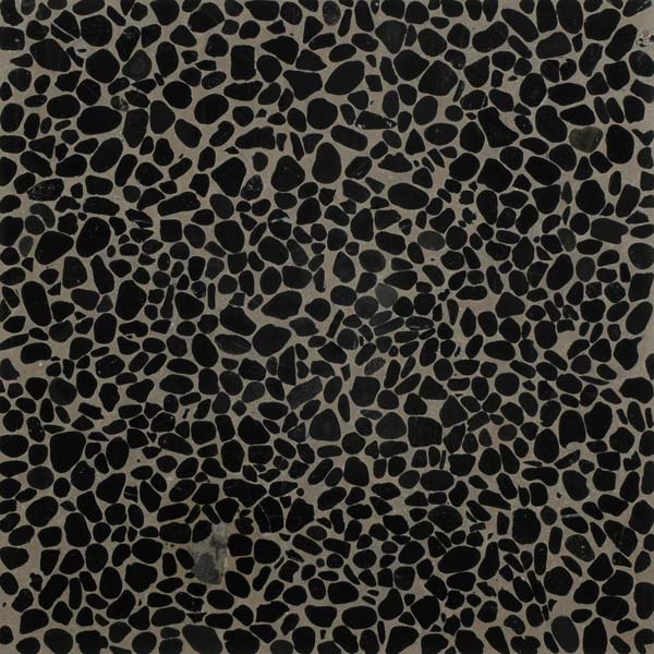 grey terrazzo tile with large black aggregate